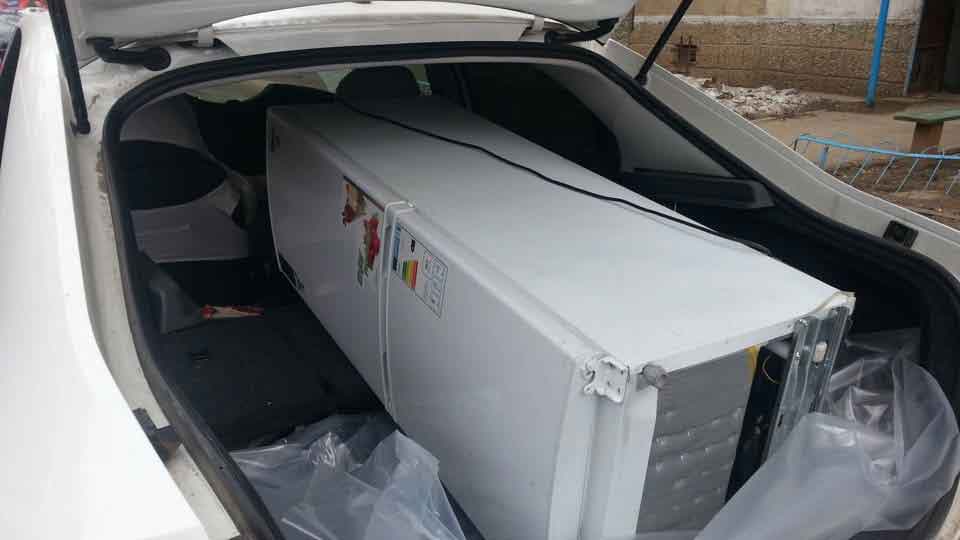 возможна транспортировка холодильника лежа в машине