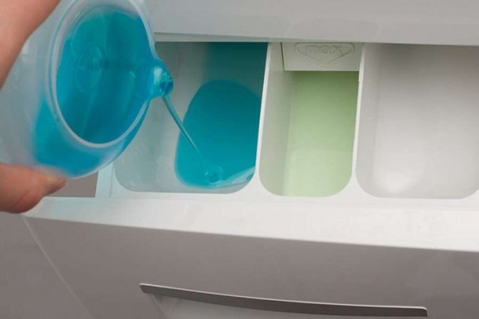 Жидкий порошок в отсеке стиральной машины